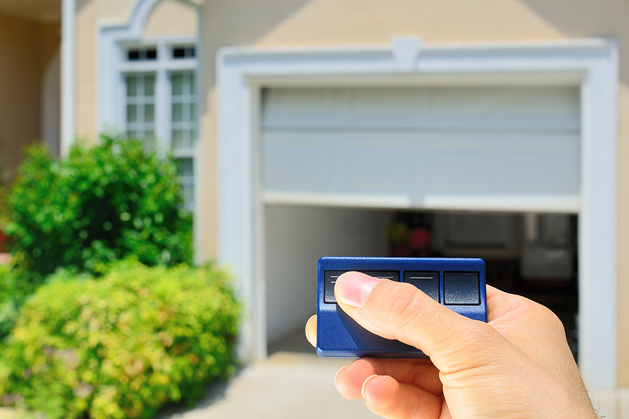 Garage Door Opener opening a residential single car garage door - Lincoln, IL