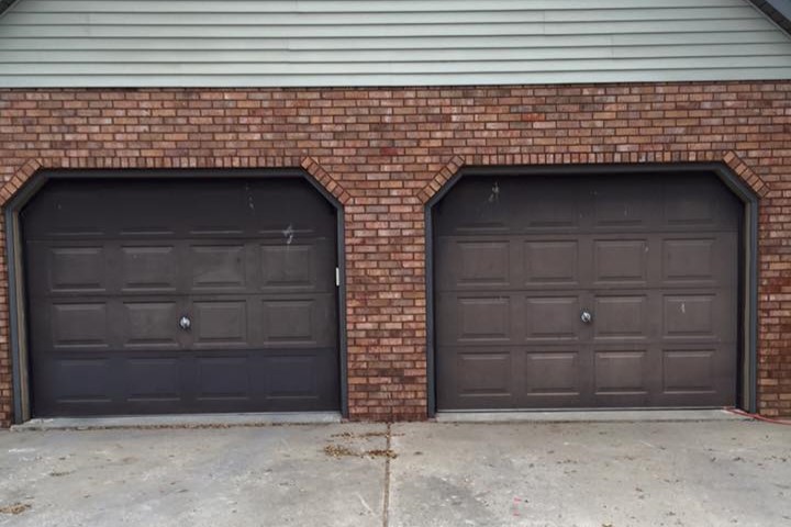 old residential Garage doors before replacement - Glenn Brothers - Springfield, IL