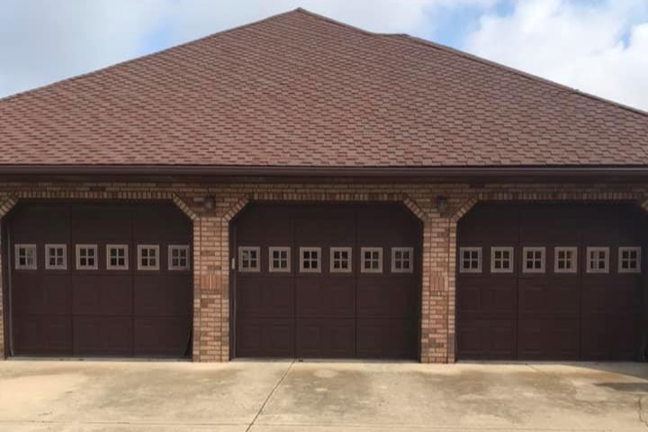 Garage doors before replacement - Glenn Brothers - Springfield, IL