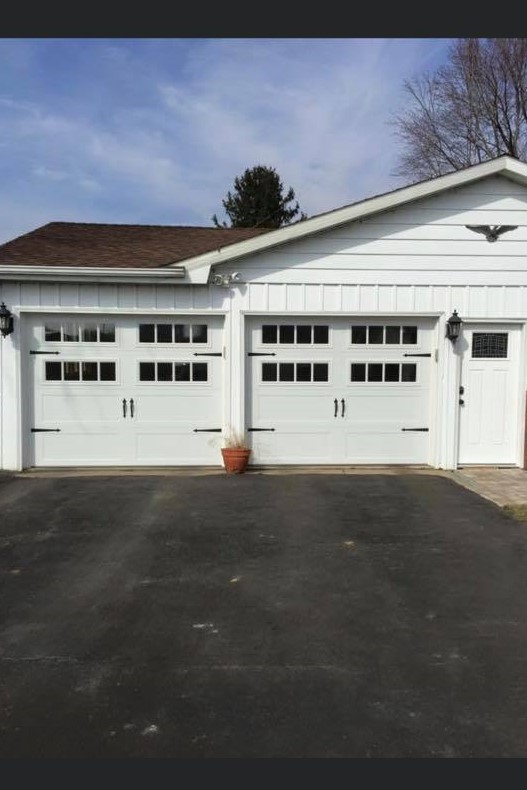 new modern residential garage doors white painted barndoor style, two single doors - Glenn Brothers - Springfield, IL