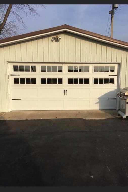new modern residential garage door white painted barndoor style - Glenn Brothers - Springfield, IL