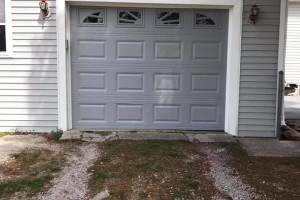 New single garage door finished product - Gray 2251 insulated foot with glass and sunburst inserts - Springfield, IL