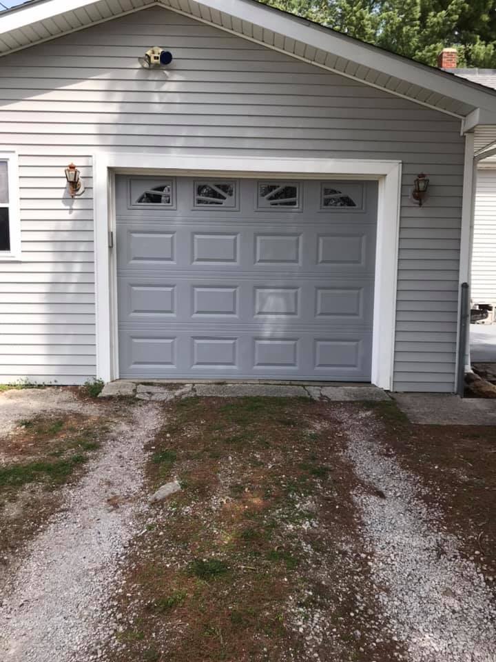 New single garage door finished product - Gray 2251 insulated foot with glass and sunburst inserts - Springfield, IL