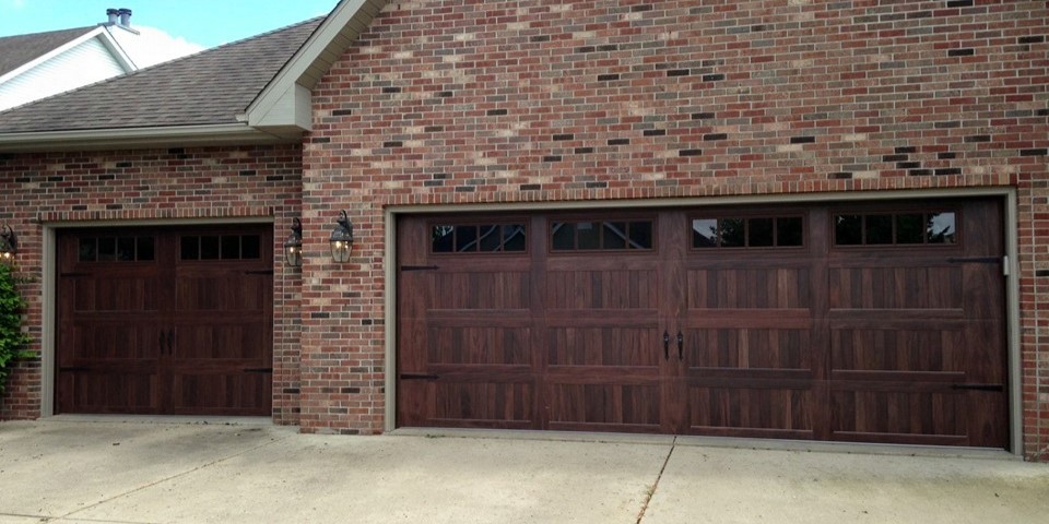 new modern garage doors, double and single doors side by side - 16x7 & 9x7 5983 in mohagany finish - Glenn Brothers - Springfield, IL