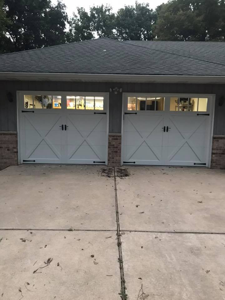 brand new modern barn door style garage doors on residential home - Springfield, IL